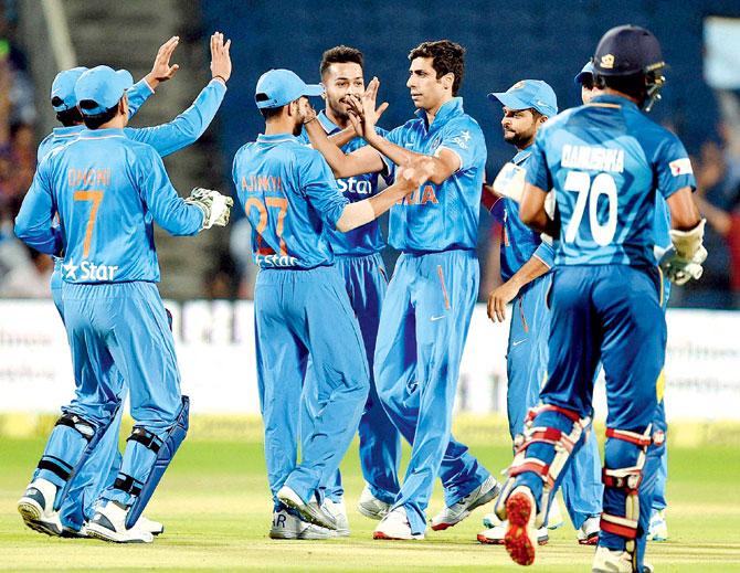 India players celebrate the wicket of Sri Lanka