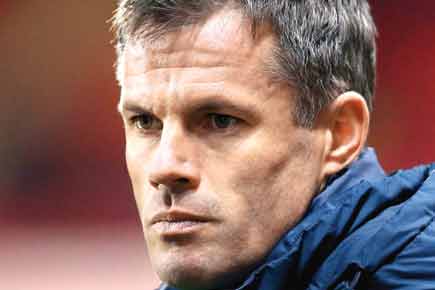 TV pundit Jamie Carragher sorry for spitting at teenage girl in a car