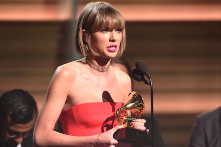 Taylor Swift takes dig at Kanye West at Grammys