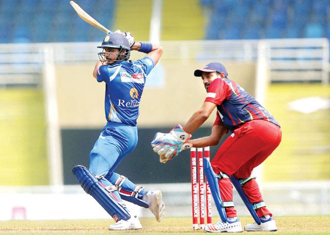 Axar Patel en route his 50 at the DY Patil Stadium yesterday