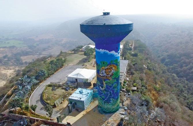 An aerial view of the mural on the water tank in the outskirts of Gurgaon