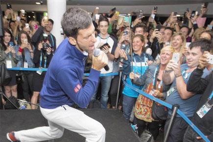 Australian Open champ Novak Djokovic shows off his singing skills