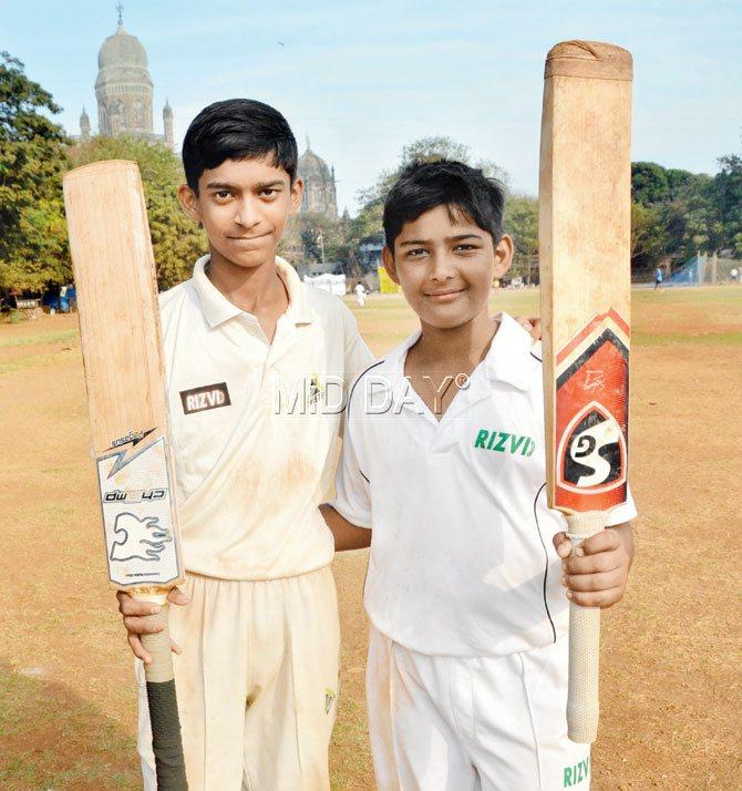 Ayaz Khan (left) and Abhinav Singh pose after playing a stellar role in Rizvi Springfield High School