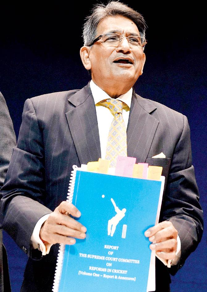 Justice RM Lodha, Chairman of the Supreme Court Committee on reforms in cricket, with the copy of the report in New Delhi last month. Pic/PTI