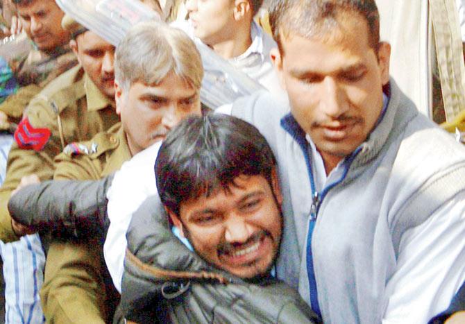 JNUSU President Kanhaiya Kumar, arrested on charges of sedition, being produced at Patiala House Courts in New Delhi on Wednesday. PTI