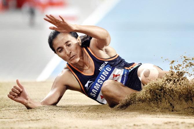 India’s Mayookha Johny competes in the final of the women’s triple jump event during the 17th Asian Games at Incheon in 2014. Pic/AFP