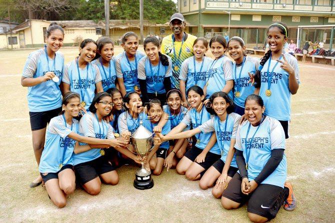 St Joseph’s girls pose with the trophy after their win over St Elias (Khar) in the Fr Donnelly Challenge tournament at St Stanislaus ground in Bandra on Saturday. PICS/PRADEEP DHIVAR