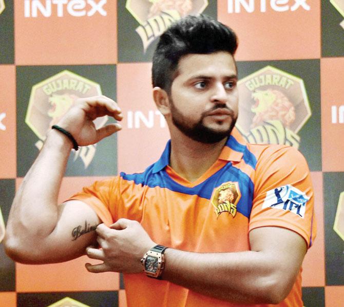 Suresh Raina at the unveiling of Gujarat Lions’ jersey in New Delhi on Saturday. PIC/PTI