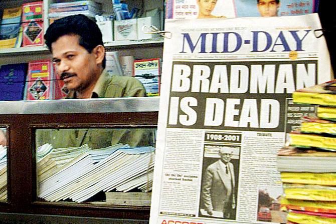 A newspaper stall at CST displays the afternoon edition of mid-day announcing the death of Sir Don Bradman on February 25, 2001 at the age of 92. file Pic/Getty Images