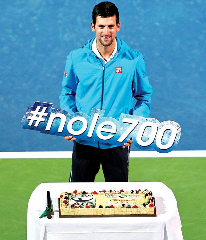 Novak Djokovic holds his winner