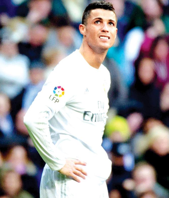 Real Madrid midfielder Cristiano Ronaldo reacts after their defeat to Atletico Madrid. Pic/AFP
