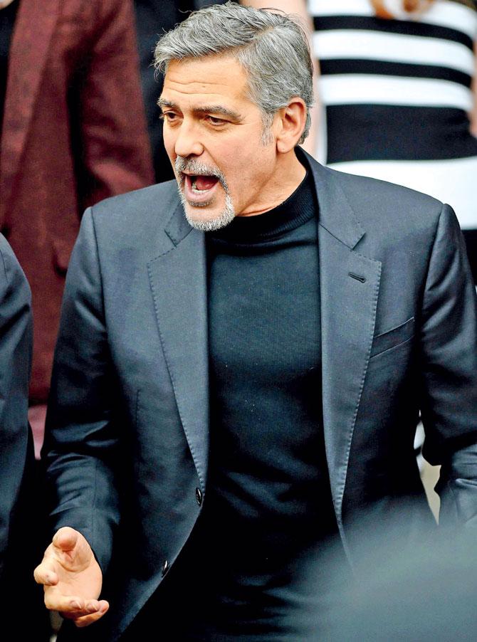George Clooney is unequivocally accepted as well groomed by stylists. Pic/AFP