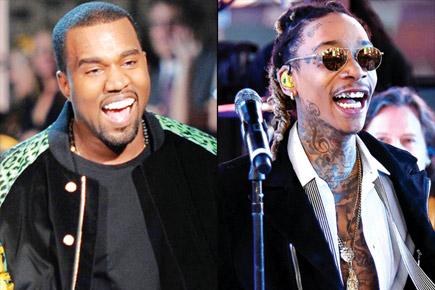 Rappers Kanye West and Wiz Khalifa bury the hatchet