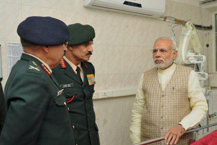 PM Narendra Modi visits soldier, hails his 'indomitable spirit'
