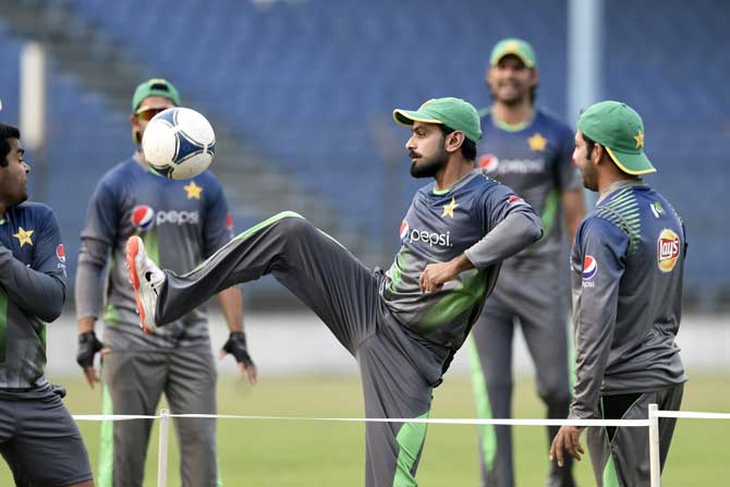 Pakistani cricketers attend a training session at the Khan Shaheb Osman Ali Stadium in Fatullah on February 26, 2016.