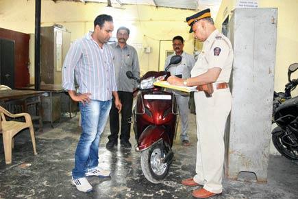 Mumbai: Sick of buses, couple uses company ATM card to buy scooter, held