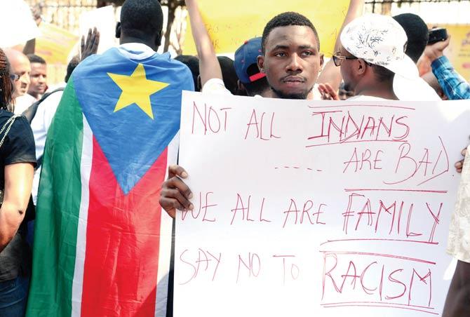 African students at a rally in Hyderabad on Saturday, in support of the Tanzanian nationals who were assaulted by a mob in Bangalore. It is absurd to hear the government repeatedly deny that racism played a part in the attack. Pic/AFP