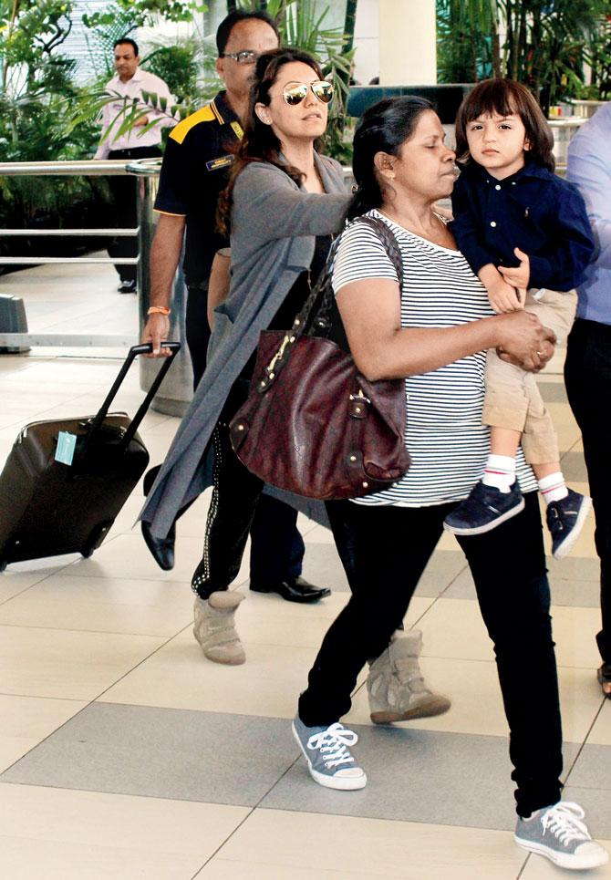 An August 2015 photo of Gauri Khan (in glares) spotted at the airport with AbRam
