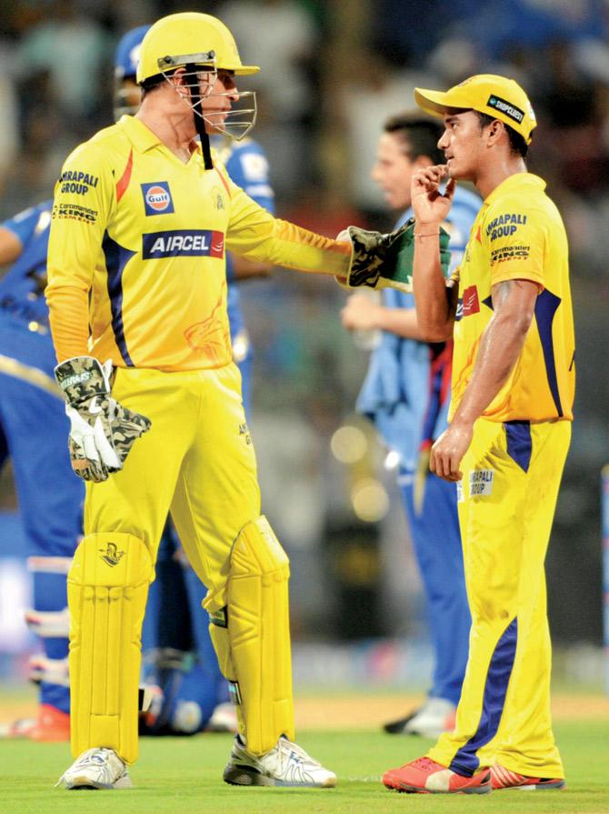 CSK skipper MS Dhoni with Pawan Negi during the IPL tie vs Mumbai Indians at Wankhede last year