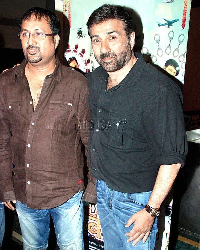 Director Manoj Tiwari spotted with Sunny Deol at a music launch.