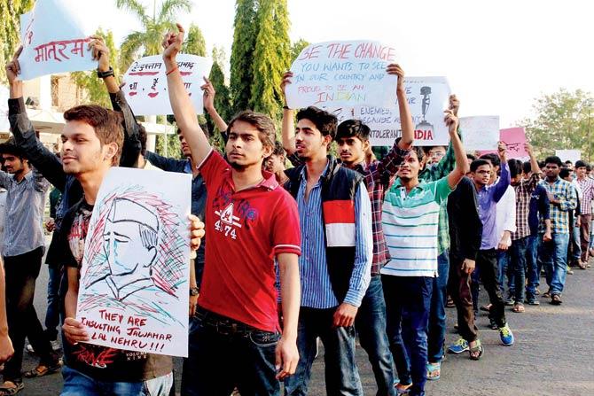 Engineering students of Maulana Azad National Institute of Technology take out a rally — against the role of JNU students union in alleged sedition-related activities — in Bhopal yesterday. Pics/PTI