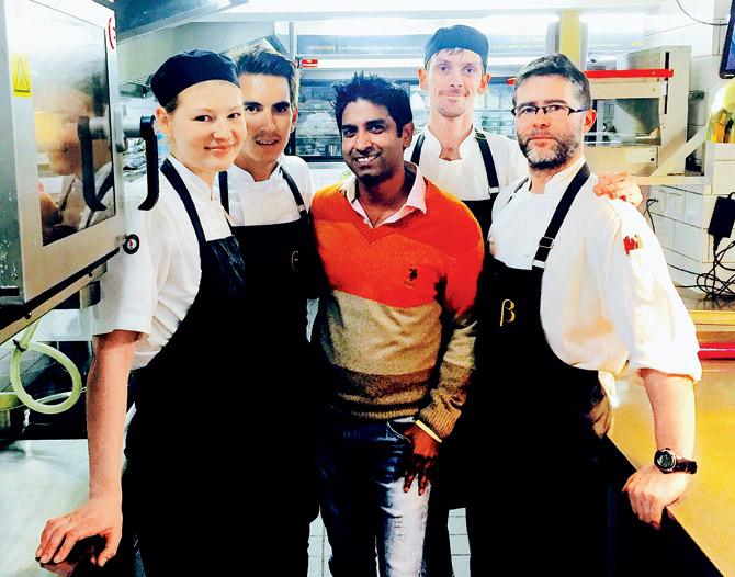 Chef Rohan D’Souza (in orange) with the chefs at George Calombaris’ The Press Club in Melbourne