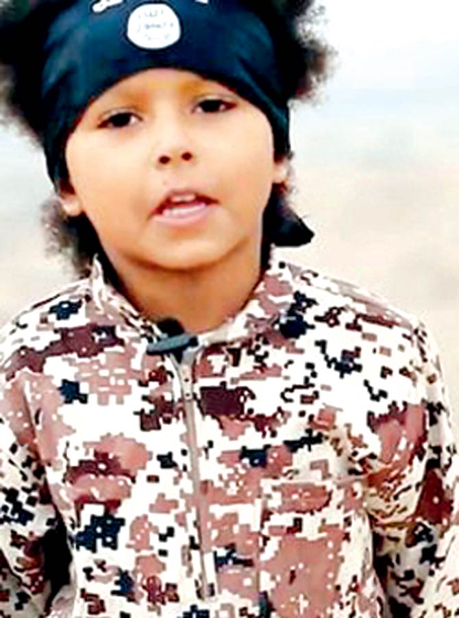 The boy, identified as Isa Dare, had also appeared in another propaganda video by ISIS a month ago.