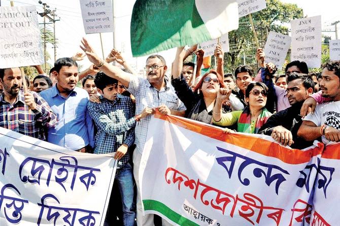 Activists in Assam take out a protest rally against the alleged anti-national activities at JNU in Guwahat on Saturday. Pic/PTI