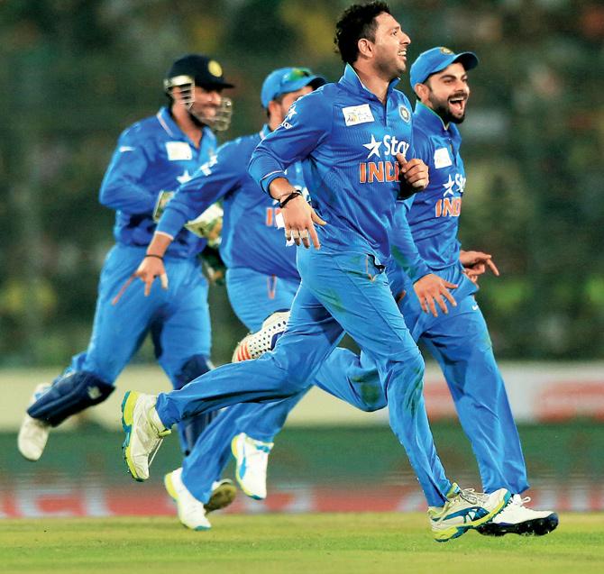 GOT THAT MAN: Jubilant Indian players celebrate the dismissal of Pakistan skipper Shahid Afridi at the Sher-e-Bangla National Cricket Stadium in Mirpur on Saturday. PIC/AFP