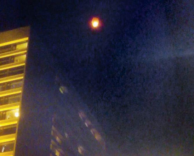 Of the three sky lanterns, two flew over the hotel and eventually extinguished, while one grazed the fourth floor, sparking concerns that the building could catch fire