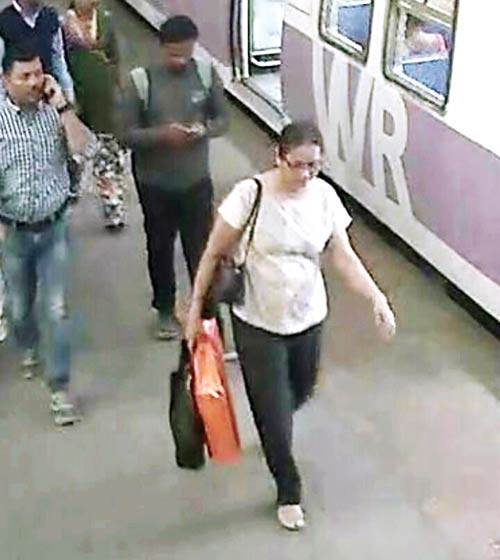 CCTV footage from Churchgate station shows an unidentified woman who seems to have taken Miti Bora’s lehenga away