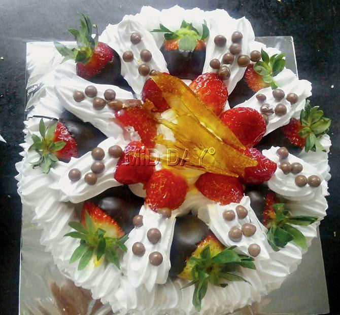 Chef Mehernosh Khajotia uses burnt sugar to create a crystal shard-like effect on the cake