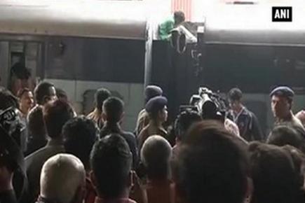 Mentally unstable man climbs over train in Lucknow