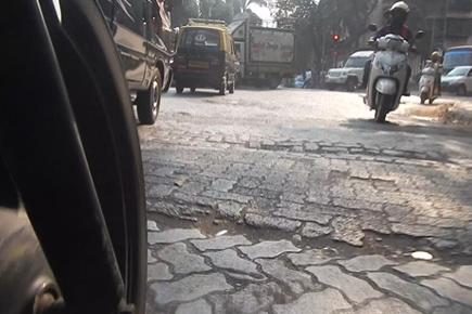Watch video: mid-day photographer puts bumpy Mumbai roads to test