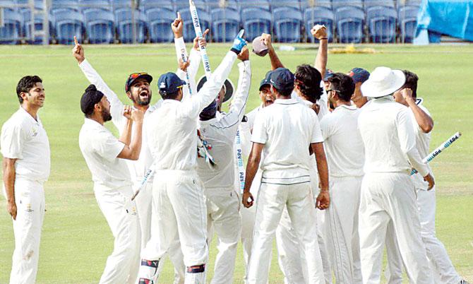 The Mumbai team celebrate their Ranji Trophy triumph in Pune yesterday. Pic/PTI