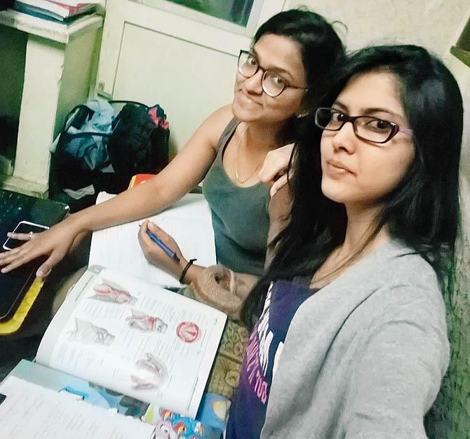Pooja Kallur (left) and Karishma Bhosale in their room on the hostel’s fourth floor