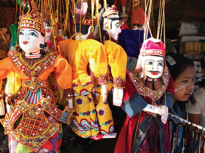 Shop for traditional Asian puppets along the highway  