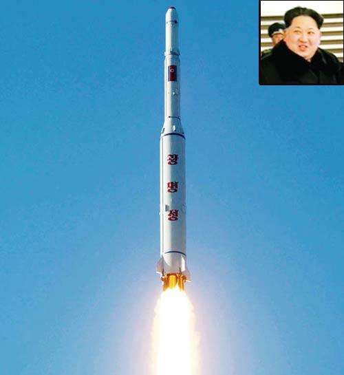 North Korean leader Kim Jong-Un attends the rocket launch. Pics/KCNA VIA KNS. (Insert) This picture released from North Korea’s official Korean Central News Agency (KCNA) shows North Korea’s rocket launch