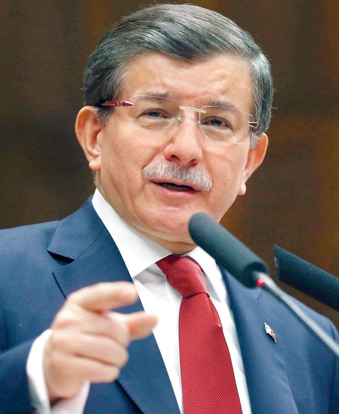 Turkish PM Ahmet Davutoglu delivers a speech at the Grand National Assembly of Turkey in Ankara yesterday. Pic/AFP