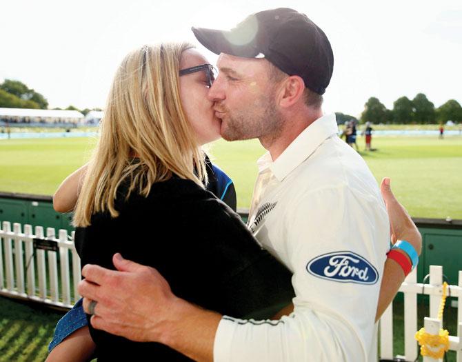 New Zealand skipper Brendon McCullum kisses his wife Ellissa after his feat in Christchurch on Saturday. PIC/Getty Images