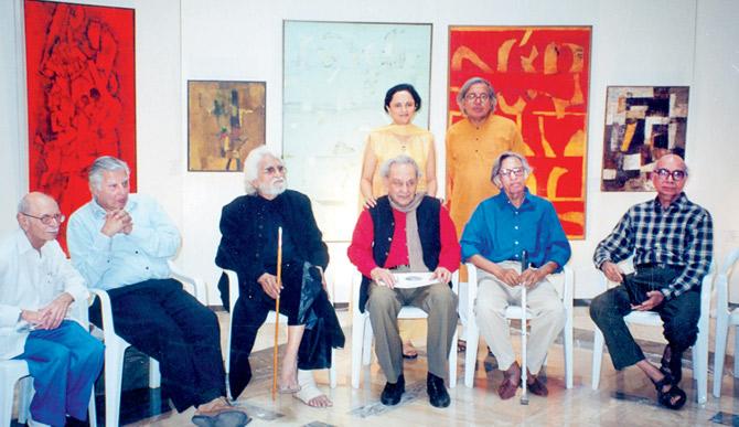 (Left-right, seated) Indian masters Jehangir Nicholson, Krishen Khanna, MF Husain, SH Raza, Tyeb Mehta and Bal Chhabda; (standing) Kalpana Shah and Ashok Vajpeyi at Tao Art Gallery in 2001