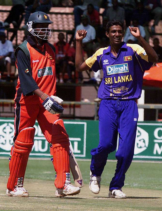Sri lankan bowler Mohamed Maharoof, right, celebrates Zimbabwes last wicket of Tinashe Panyangara