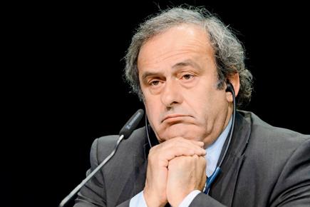 Michael Platini pulls out of FIFA race