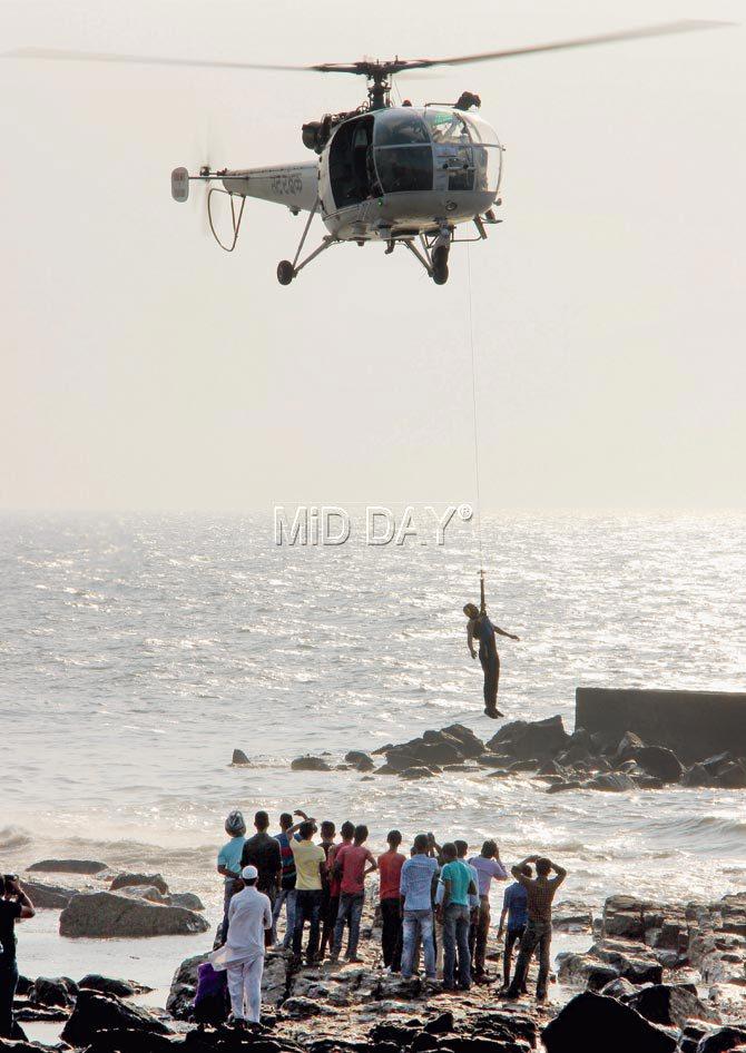 A coast guard helicopter conducts a search operation. pics/onkar devlekar