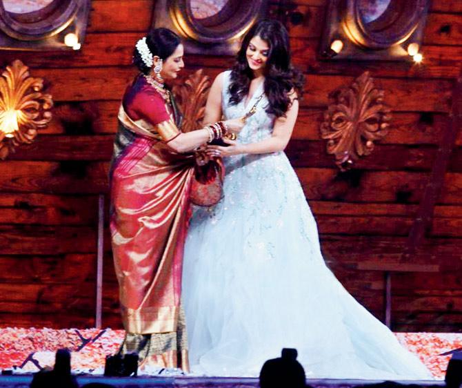 Rekha (left) and Aishwarya Rai Bachchan