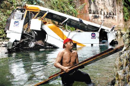 Amateur footballers and fans dead as team bus falls into Mexico river