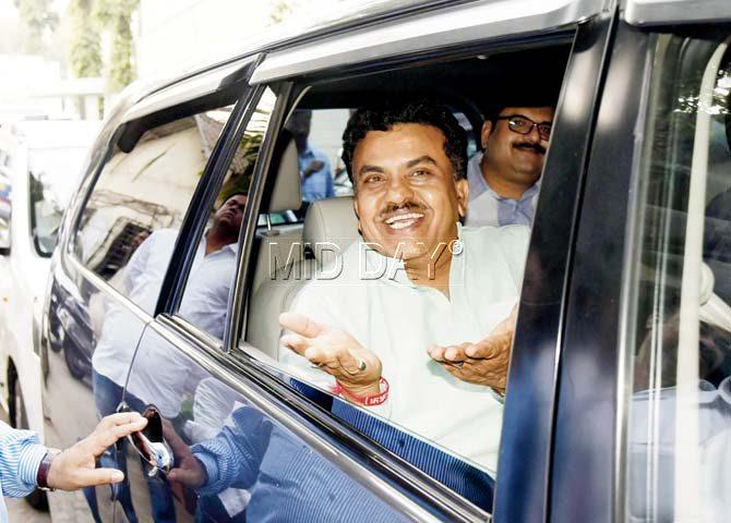 Sanjay Nirupam laughs as he leaves after the ruckus. Pics/Shadab Khan