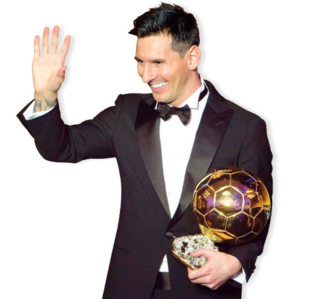 Lionel Messi waves to the audience after winning the Ballon d’Or on Monday. Pic/Getty Images