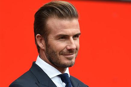 Ex-England star David Beckham receives UNICEF award