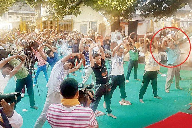 Peter Mukerjea does yoga at Arthur Road at a session held by Baba Ramdev on Saturday 